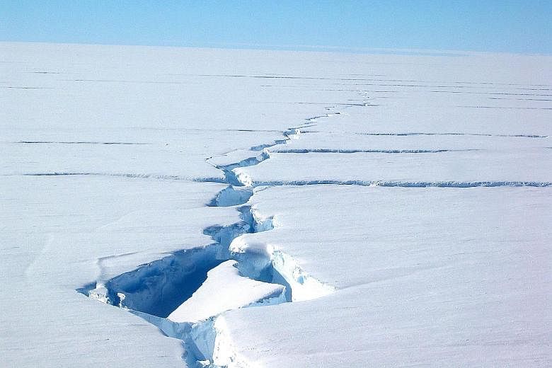 A picture courtesy of the Australian Antarctic Division showing a "loose tooth" on the Amery Ice Shelf in eastern Antarctica. The 1,636-sq km table iceberg, officially called D-28, separated from the front of the ice shelf on Sept 26. Scientists do n