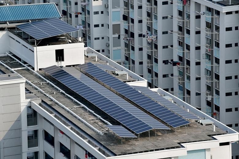 Solar panels on the rooftop of an HDB block in Ang Mo Kio. In the latest tender, Sunseap Group, which will install solar panels in housing blocks managed by the Pasir Ris-Punggol and Holland-Bukit Timah town councils, will deploy at least 170,000 bif