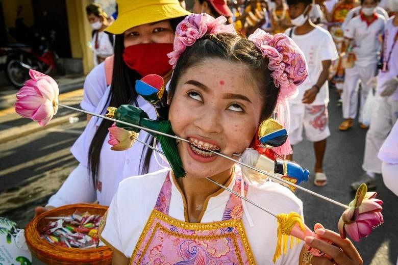 Phuket hosts cheek-piercing vegetarian festival | The Straits Times