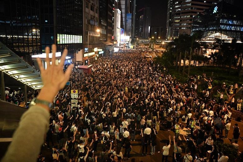 Singaporeans In Hong Kong Advised To Take Precautions As City Prepares 