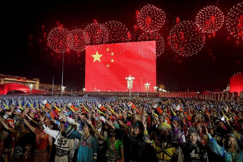 Fireworks exploding over Tiananmen Square on Tuesday at the evening gala marking the 70th founding anniversary of the People's Republic of China. Realising that some of the emotions displayed at the parade are genuine is important because we can't un