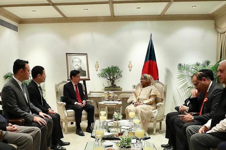Deputy Prime Minister Heng Swee Keat meeting Indian PM Narendra Modi (left) and Bangladesh PM Sheikh Hasina in New Delhi yesterday. PHOTOS: PRESS INFORMATION BUREAU, GOVERNMENT OF INDIA; MINISTRY OF COMMUNICATIONS AND INFORMATION