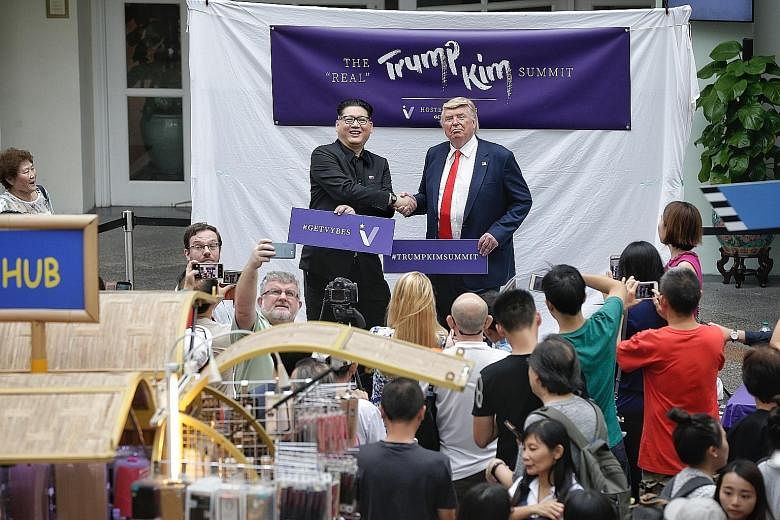 (Left) North Korean leader Kim Jong Un and United States President Donald Trump in Singapore for the Trump-Kim summit in June last year. (Right) Their impersonators Howard X and Dennis Alan at Bugis Junction during a fan meet-up the same month.