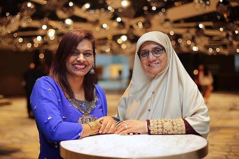 Pre-school teacher Peria Nayakhi Manivasagam (left) won Jamiyah Singapore's Exemplary Young Mother Award, while Madam Jamalia Shariff won the Exemplary Mother Award. Both have three children each.