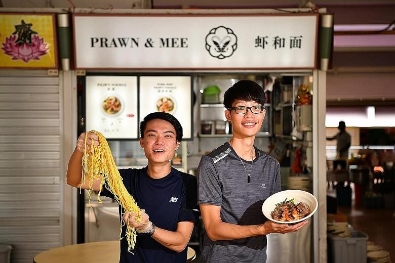 (From far left) Mr Gladwin Yap and Mr Raphael Sim serve hawker-style prawn noodles with soup that is enhanced with a mirepoix - a combination of sauteed carrot, celery and onion.