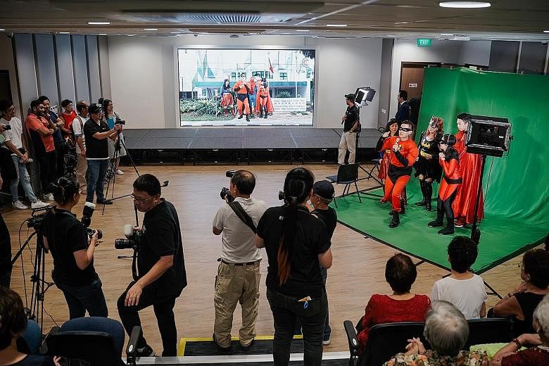 Green-screen technology, which is used to create computer-generated environments, being showcased at the reopening of Radin Mas Community Club yesterday. Besides the digital initiatives, the revamped community club also boasts new facilities such as 