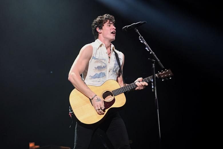 Canadian pop singer Shawn Mendes performing at the Singapore Indoor Stadium last Friday. 