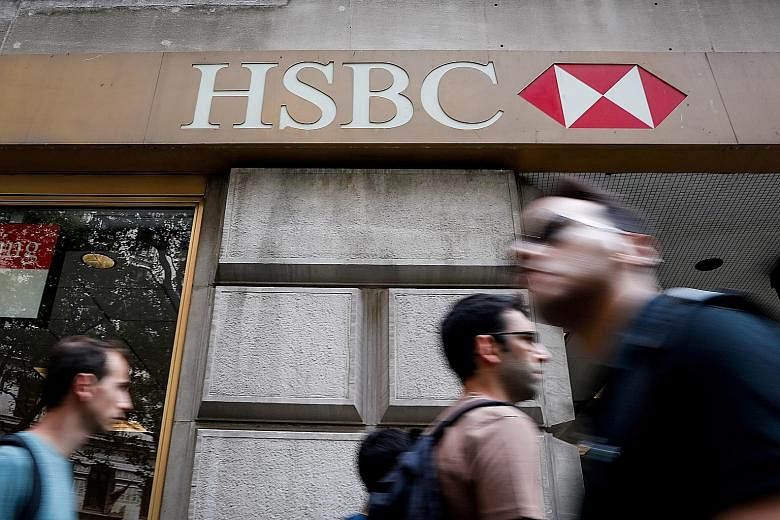 HSBC's cost-cutting drive comes as global banks lay off staff, with the industry facing low or negative interest rates and weak investment banking revenues. PHOTO: REUTERS