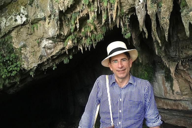 NUS science historian John van Wyhe at a cave in Sarawak.