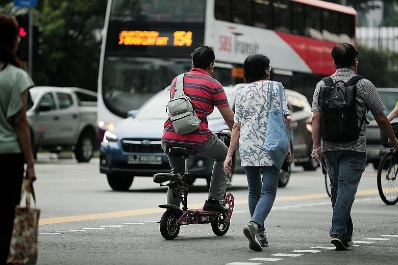 A complete ban on personal mobility devices would be difficult to enforce because of their widespread use, say observers. About 90,000 e-scooters have been registered with the Land Transport Authority as of August.
