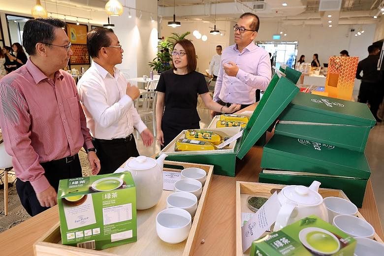 (From left) FairPrice corporate communications and brand director Jonas Kor, chief executive Seah Kian Peng, managing director and deputy head of products Grace Chua and deputy chief executive and head of products Tng Ah Yiam with some of the superma