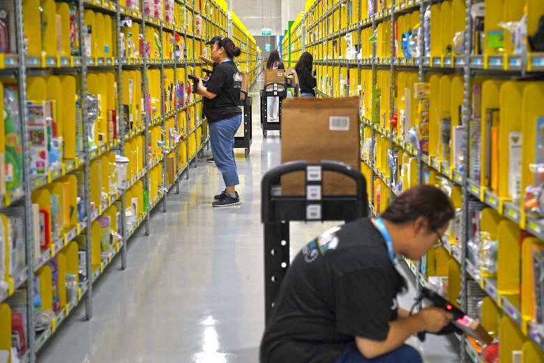 Amazon's Prime Now facility in Singapore. Amazon's entry into the market here will see it go head-on against rivals such as Lazada and Shopee.