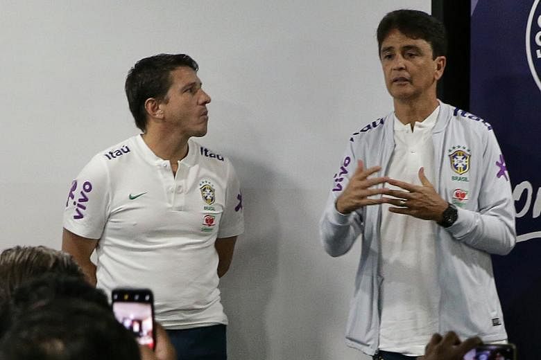 Top: Hopes are high that the current crop of Brazil players can bring home the World Cup from Qatar in 2022. Above: Former Brazil national players Juninho Paulista (left) and Bebeto sharing their knowledge and experience during a clinic at Jalan Besa