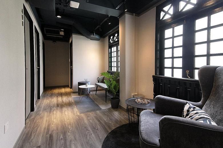 Above and below: ST Signature Chinatown in South Bridge Road is the first in Katrina Group's "affordable luxury" line of co-living hotels. It offers spaces for guests to work and mingle, as well as a smart self-check-in system, and will be closely fo