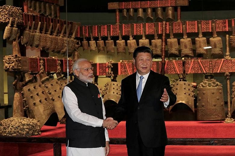 Chinese President Xi Jinping and Indian Prime Minister Narendra Modi visiting the Hubei Provincial Museum in Wuhan, where the two leaders held their first informal summit, in April last year.