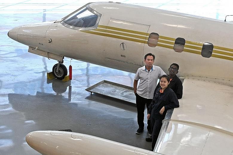 A team comprising ITE College Central students Michael Cham, 57, Nicole Ng, 17, and Steven Muthukumar, 17, won the top prize in the prototypes category of the Aviation Innovation Competition organised by the International Civil Aviation Organisation,