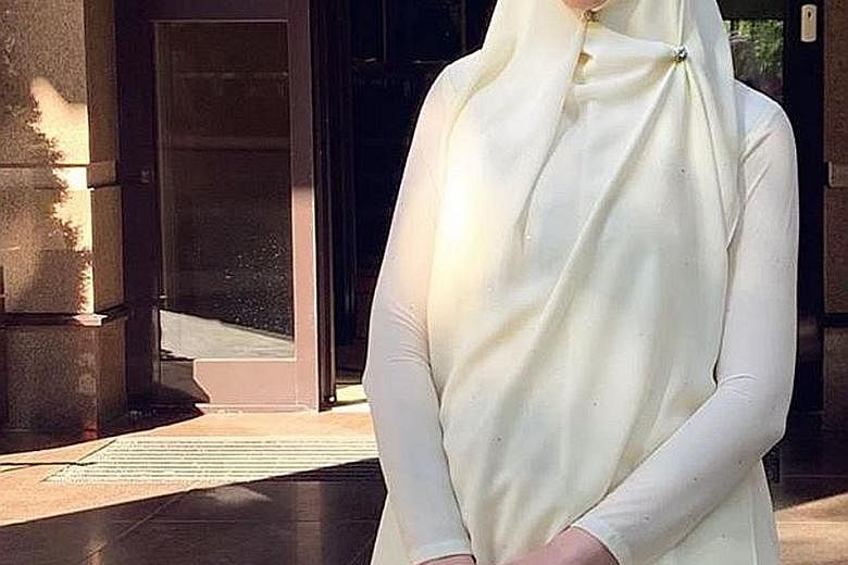 Ms Oksana Voevodina claims that her ex-husband, the former Malaysian king, abandoned her during her pregnancy. He is refuting her claims as false. PHOTO: RIHANA OKSANA PETRA/INSTAGRAM
