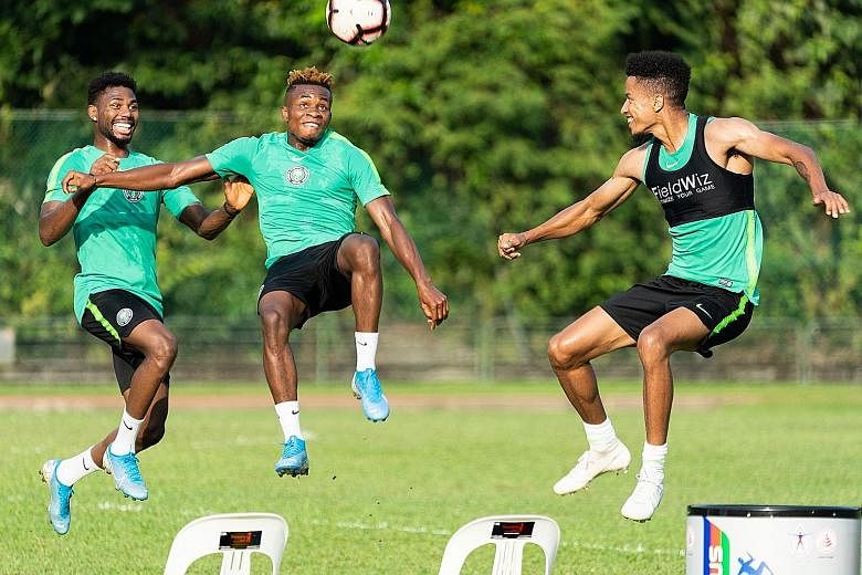 Nigeria players having fun during their training session at the Bukit Gombak Stadium yesterday. The African side will face Brazil at the National Stadium tomorrow as part of the Brazil Global Tour.