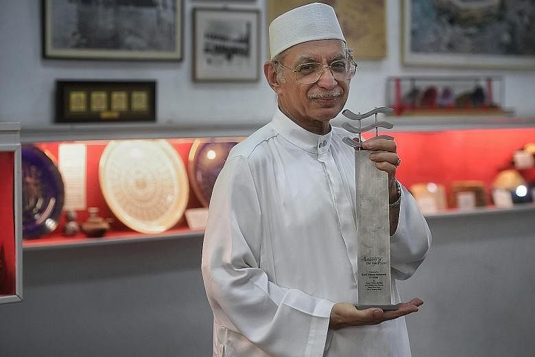 Imam Syed Hassan Mohamed Al-Attas has been the head of Masjid Ba'alwie in Lewis Road for more than four decades. The mosque houses a collection of artefacts from different faiths, including ancient Bibles and Torahs.