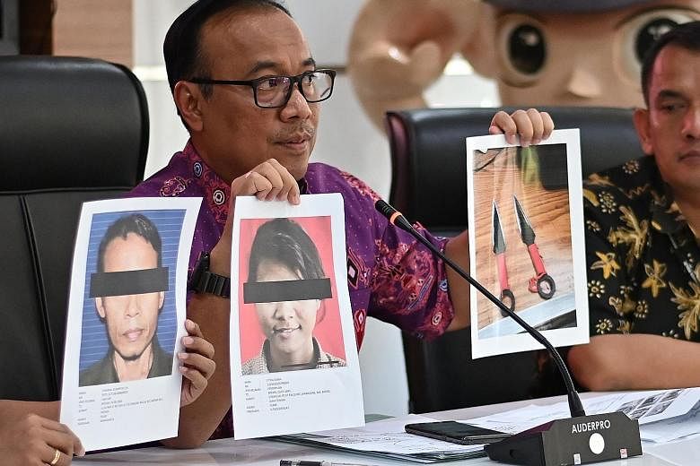 National police spokesman Dedi Prasetyo briefing journalists in Jakarta yesterday about the attack on Indonesia's chief security minister Wiranto, who was stabbed twice by a militant on Thursday. PHOTO: AGENCE FRANCE-PRESSE