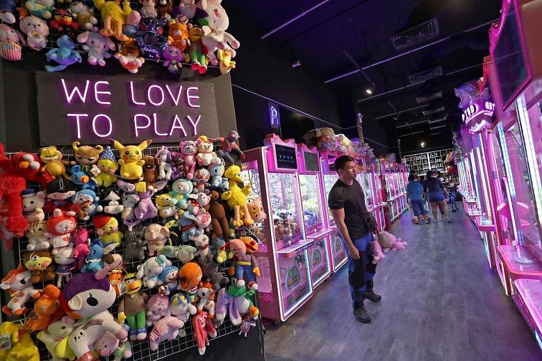 Claw machines reeling in fans young and old | The Straits Times