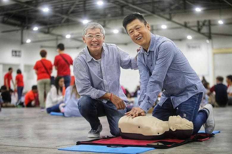 Mr Charleston Chua (left) collapsed after lunch three years ago and his friend Peter See performed cardiopulmonary resuscitation on him until the ambulance came.