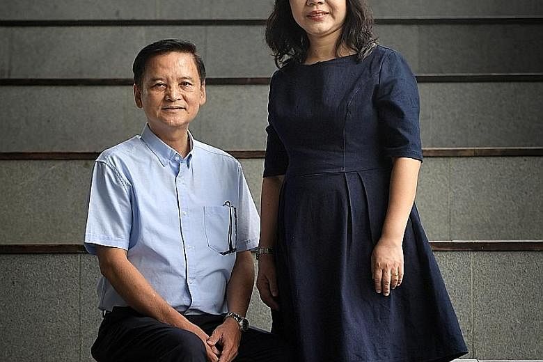 Mr Kelvin Quak, 60, with his wife, Madam Khoo Lay Hwa, 51. Mr Quak has remained free of drugs - and crime - for close to three decades, and is committed to helping others steer clear of them as a social worker with the Methodist Missions Society. ST 