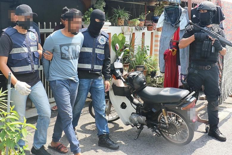 Counter-terror police in Malaysia arresting men, said to be sympathisers of the defunct Liberation Tigers of Tamil Eelam in Sri Lanka, last Saturday in Melaka and Penang. Two ethnic Indian Democratic Action Party assemblymen were among the 12 men nab
