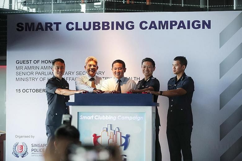 Senior Parliamentary Secretary for Home Affairs Amrin Amin (centre) at the launch of the second iteration of the Smart Clubbing Campaign, which aims to enhance the safety and image of nightspots in Singapore.