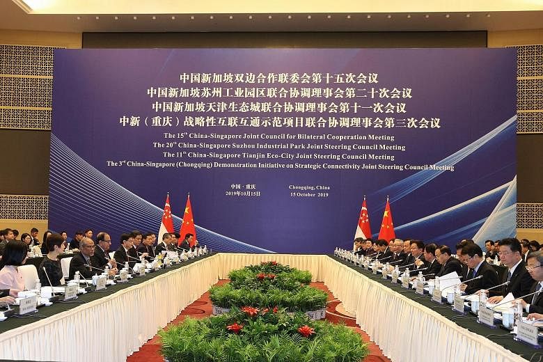 The Singapore delegation at yesterday's Joint Council for Bilateral Cooperation meeting in Chongqing included (from left): Senior Minister of State for Communications and Information, and Culture, Community and Youth Sim Ann; Minister for Manpower an