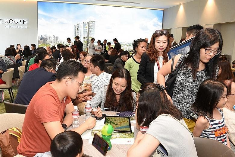 The crowd at the preview of Avenue South Residence, which was launched last month. The condominium in the city fringe made top seller last month, with 361 units moved at a median price of $1,941 per sq ft. PHOTO: UOL GROUP