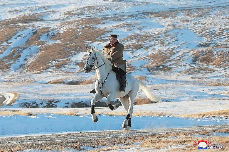 This undated photo provided by state news agency KCNA yesterday shows North Korean leader Kim Jong Un riding a white horse on the snow-covered Mount Paektu, the spiritual homeland of the Kim dynasty. Mr Kim has often made trips to the sacred mountain