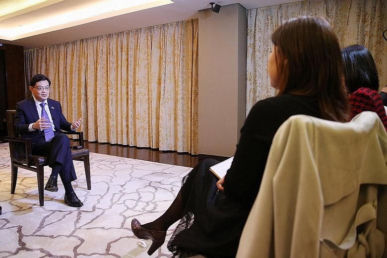 Deputy Prime Minister Heng Swee Keat, speaking to Singapore reporters during an interview in Beijing yesterday, said that the Republic must stay relevant and useful not just to China, but also to the world. PHOTO: MCI