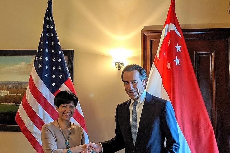 Minister in the Prime Minister's Office and Second Minister for Finance and Education Indranee Rajah with US Deputy Treasury Secretary Justin Muzinich in Washington on Wednesday.