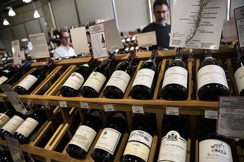 French wine displayed at a Los Angeles shop this month. The Trump administration's move to impose tariffs on European Union products, including wine, kicked in just days after the US was given the formal go-ahead by the World Trade Organisation.