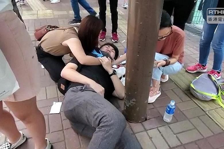 A 19-year-old man was severely hurt after being slashed in the neck and abdomen in Tai Po district in Hong Kong yesterday. PHOTO: RTHK VNEWS