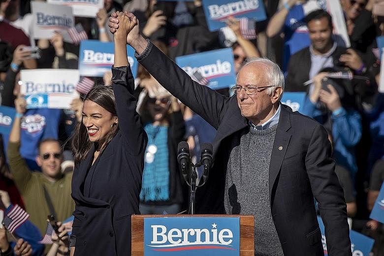 US Democratic Representative Alexandria Ocasio-Cortez of New York and presidential candidate Bernie Sanders appearing at a "Bernie's Back" rally in the Queens borough of New York last Saturday, marking the Vermont senator's return to the campaign tra