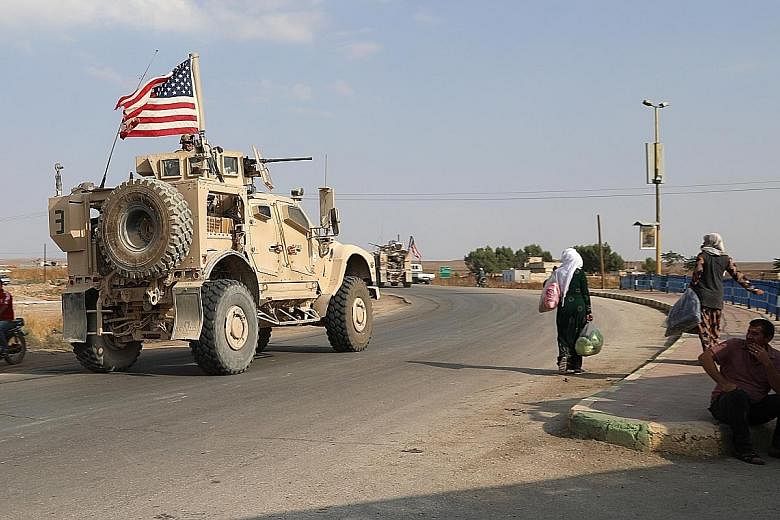 American troops heading towards the Iraqi border in north-eastern Syria on Sunday, as part of a withdrawal announced by President Donald Trump which has been criticised in Washington and elsewhere.