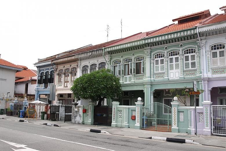 Left: Temasek Shophouse in Orchard Road was the sole winner of the Urban Redevelopment Authority's award for restoration at the annual Architectural Heritage Awards. Above: A row of 1920s and 1930s shophouses in Koon Seng Road that URA conserved in 1