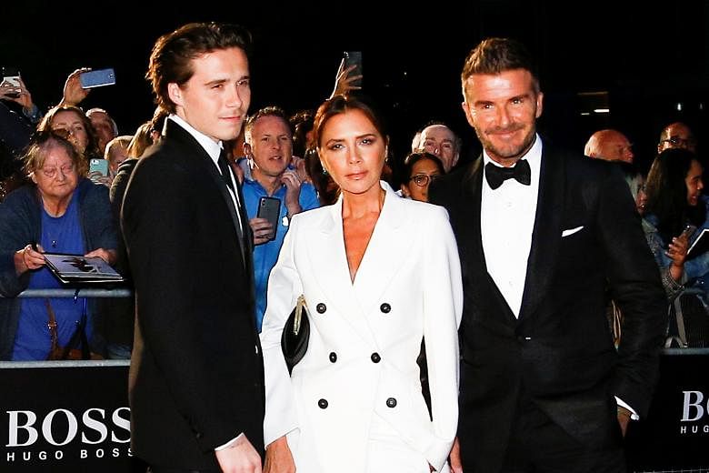 Model Phoebe Torrance (left), latest girlfriend of Brooklyn Beckham (above left, with his parents Victoria and David Beckham), is said to look like the ex-Spice Girl from certain angles.