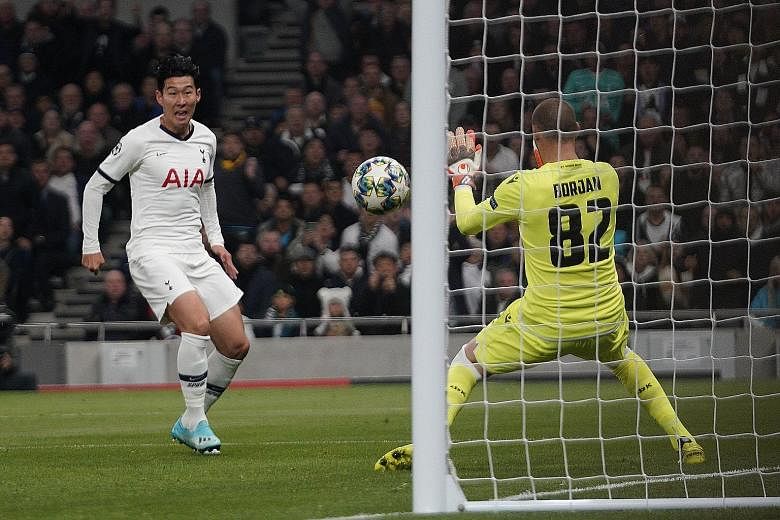 Son Heung-min lashing in Tottenham's second goal in the 5-0 hammering of Red Star Belgrade in the Champions League at the Tottenham Hotspur Stadium on Tuesday night. The win lifted Spurs to second in Group B. PHOTO: EPA-EFE