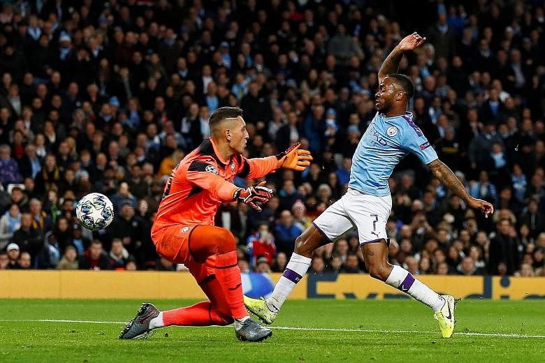 Raheem Sterling scoring Manchester City's fifth goal past Atalanta goalkeeper Pierluigi Gollini to complete his hat-trick in the Champions League game at the Etihad Stadium on Tuesday night. PHOTO: REUTERS