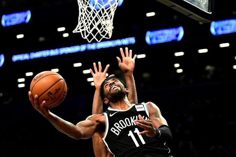 Basketball: Kyrie Irving hits 50 points in NBA debut for Nets but  Timberwolves still triumph | The Straits Times