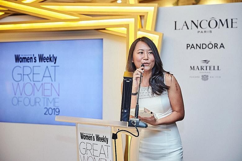 Singapore's first female professional boxer Nurshahidah Roslie was honoured yesterday with a Great Women of Our Time Award, given by The Singapore Women's Weekly magazine. Another winner was Dr Andie Ang, a research scientist at the Wildlife Reserves