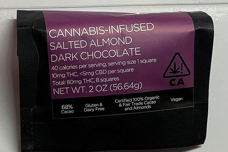 A 25-year-old woman was arrested after handing over a packet of chocolate believed to be infused with cannabis.
