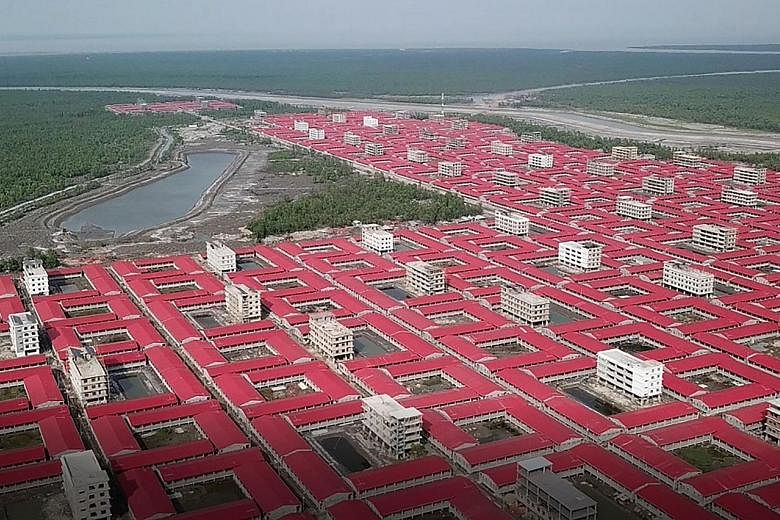 An aerial view of buildings meant to accommodate members of the Rohingya refugee community on the silt islet Bhashan Char in the Bay of Bengal. Bangladesh wants to relocate 100,000 Rohingya to the islet, which is three hours by boat from the mainland