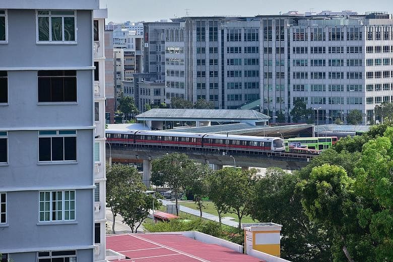 A view from Block 409 Tampines Street 41 overlooking the East-West MRT line. From a sample of 39 Housing Board flats in five locations sold between 2017 and this year, the transacted prices of units that directly faced noisy roads or MRT tracks were 
