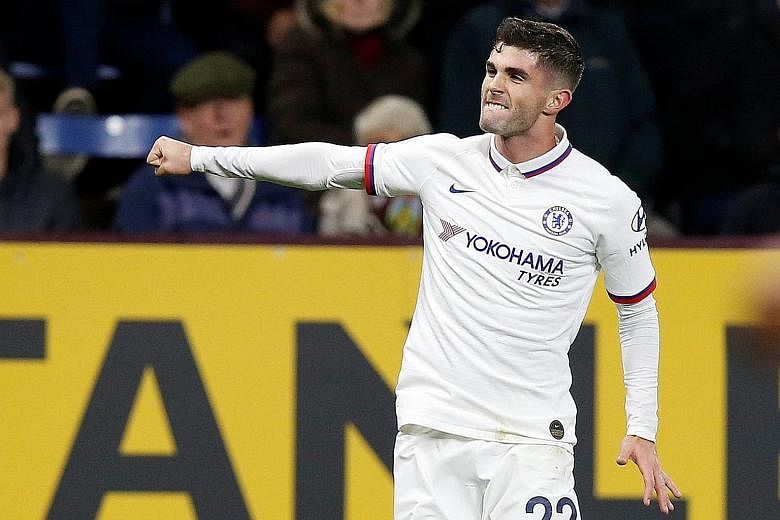 Chelsea's Christian Pulisic scoring the "perfect hat-trick" in his side's 4-2 win over Burnely in Saturday's Premier League match. He grabbed the opener with his left foot, collected his second with the other foot (above) and used the back of his head to 