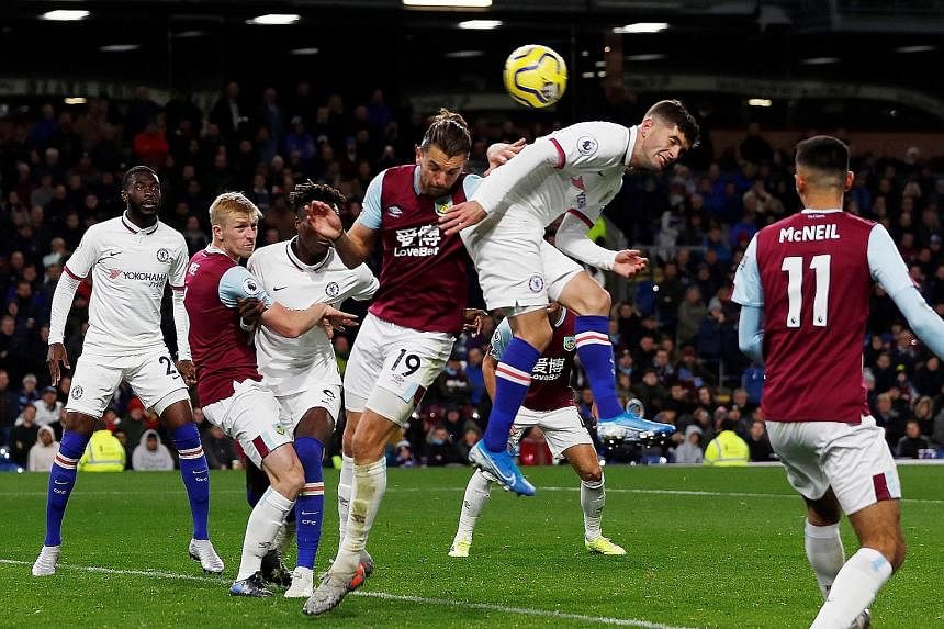 Chelsea's Christian Pulisic scoring the "perfect hat-trick" in his side's 4-2 win over Burnely in Saturday's Premier League match. He grabbed the opener with his left foot, collected his second with the other foot and used the back of his head (above) to 