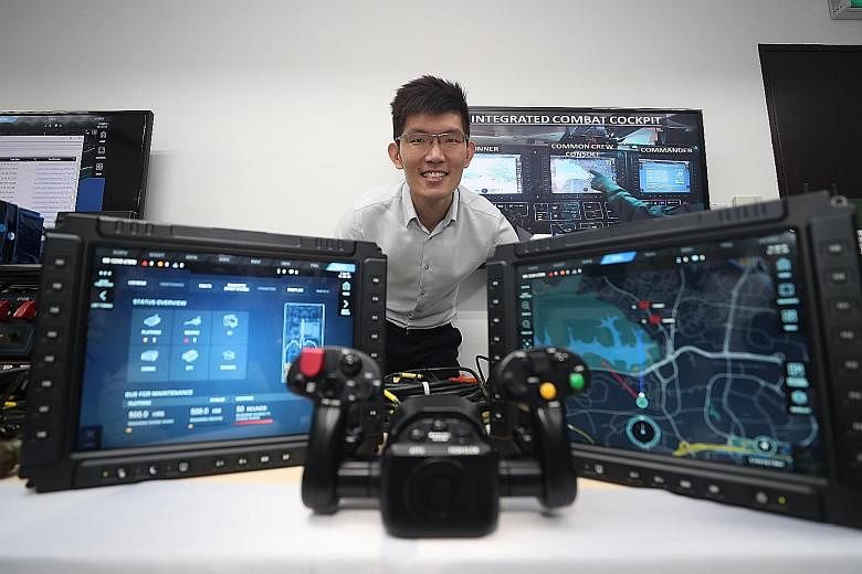 Mr William Peh, programme director at the Defence Science and Technology Agency's Land Systems Programme Centre, in the laboratory where testing is done for the Hunter Armoured Fighting Vehicle's systems. ST PHOTO: TIMOTHY DAVID